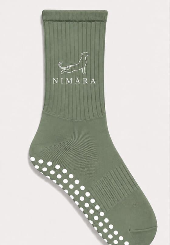 Nimāra grip socks in the studio colours